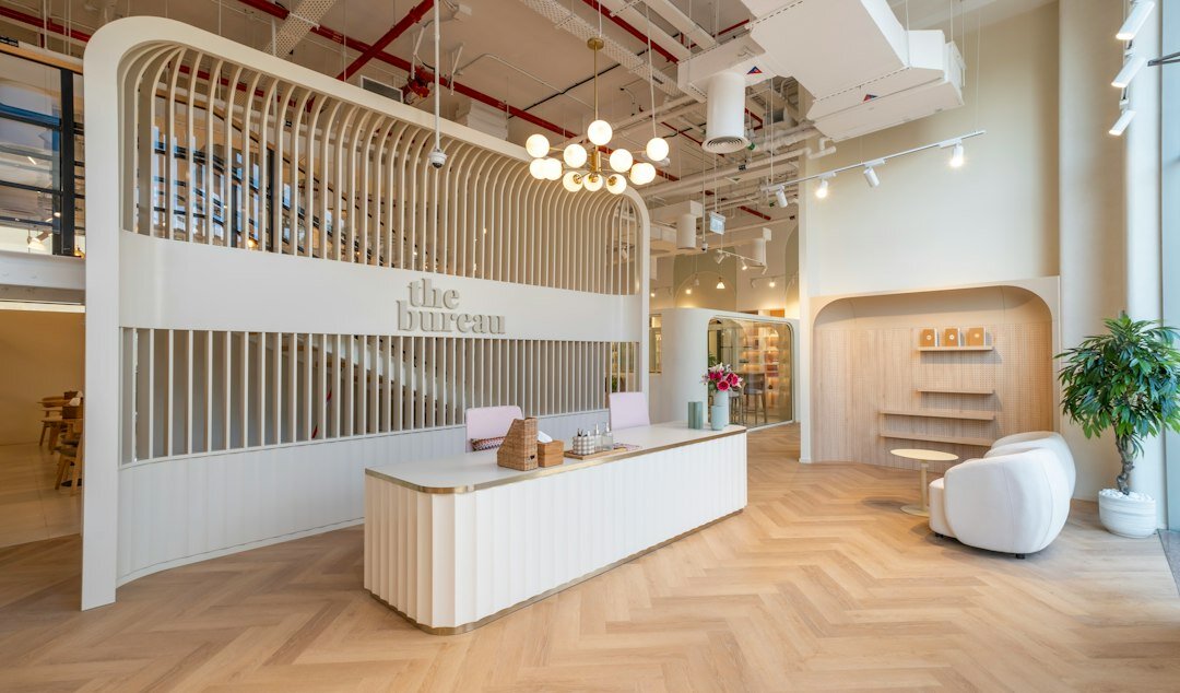 Warmly lit reception desk of a luxury boutique atelier